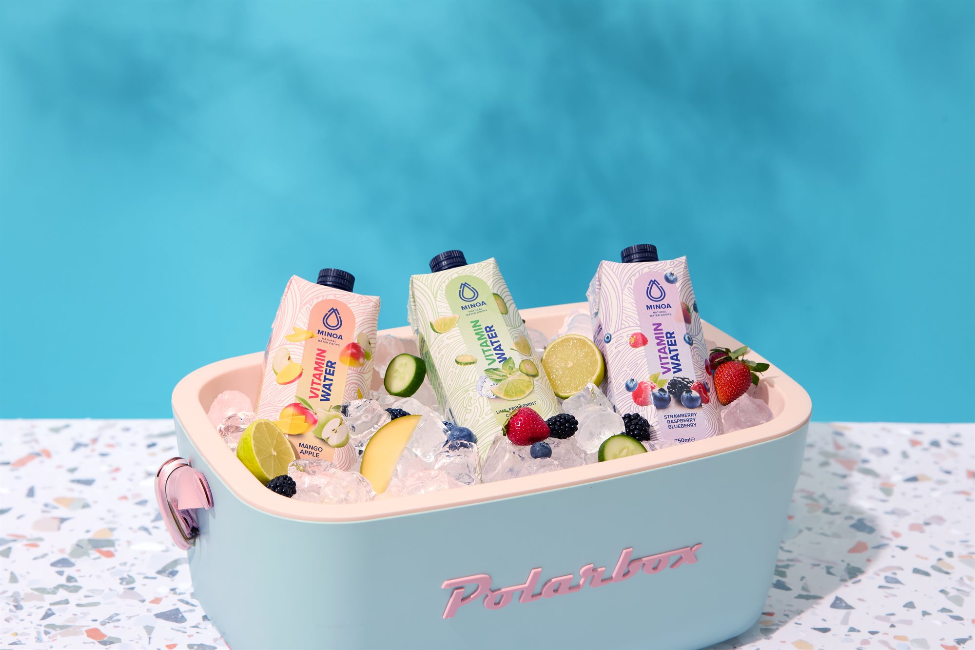 Minoa Water product range in a cooler box close-up